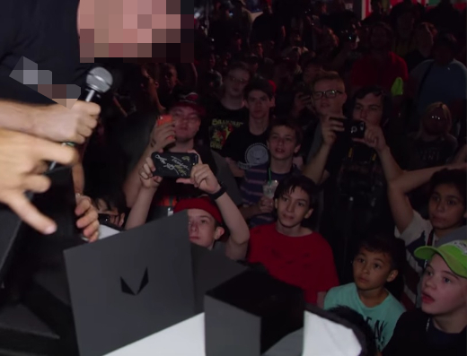 A young audience captivated by a grifter.